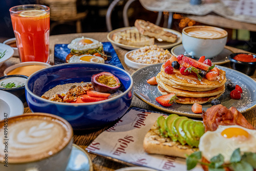 College of Breakfast Assortiment with pancakes, eggs, coffee 
