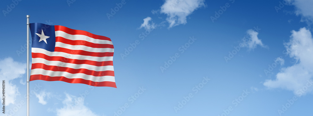 Liberian flag isolated on a blue sky. Horizontal banner