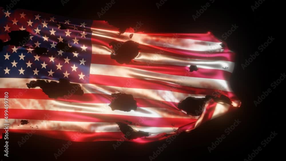 Torn American flag. Waving and flying away at the end of the torn flag of the United States on a dark background.