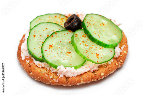 Crispy Cracker Sandwich with Fresh Cucumber, Fish Cream and Olives - Isolated on White. Easy Breakfast. Quick and Healthy Sandwiches. Crispbread with Tasty Filling. Healthy Dietary Snack - Isolation