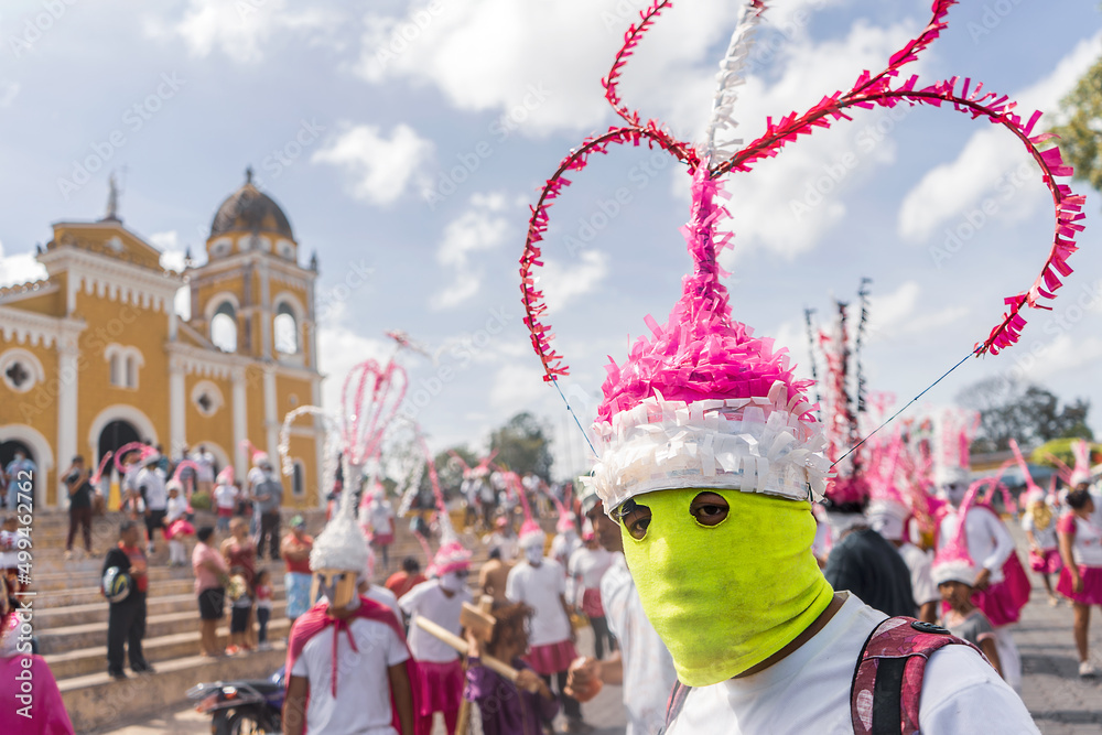Close-up of an unrecognizable masked Latino man participating in a traditional holy week festivity in Masatepe Nicaragua. Concept of culture in summer in Latin America.