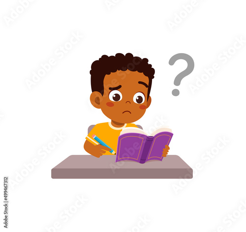 little kid reading book and feel confused