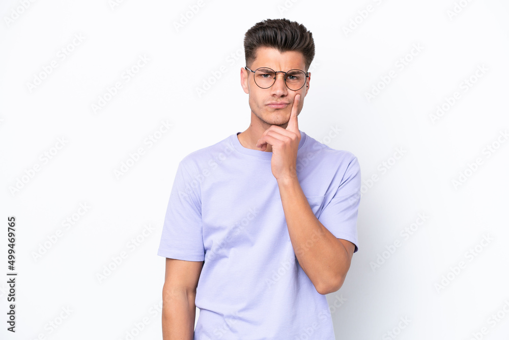 Young caucasian man isolated on white background and thinking Young caucasian man isolated on white background and thinking