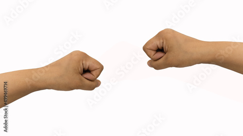 2 Female hands clenched into a fist isolated on white background photo