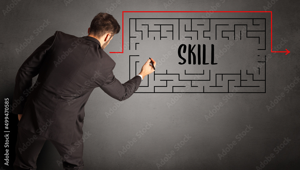 businessman drawing maze concept businessman drawing maze concept