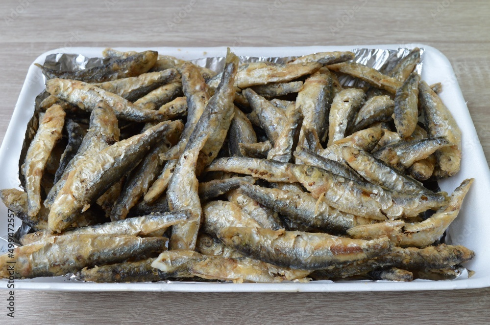 Fried fish Euroropean sprat or sardine, a small and tasty fish caught in the Irish Sea, the Black Sea, the Baltic Sea and the Sea of the Hebrides. Fried fish Euroropean sprat or sardine, a small and tasty fish caught in the Irish Sea, the Black Sea, the Baltic Sea and the Sea of the Hebrides.