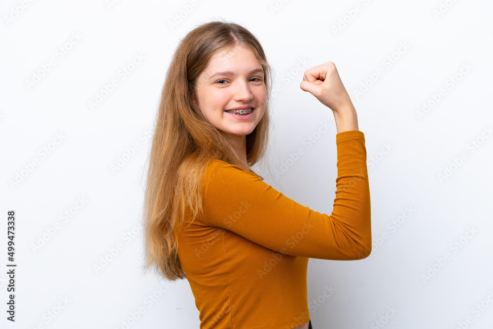 Teenager Russian girl isolated on white background doing strong gesture Teenager Russian girl isolated on white background doing strong gesture