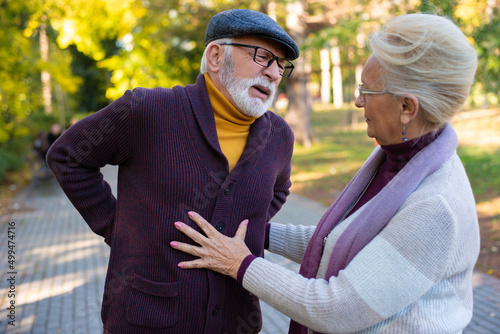 Принти на полотні Caucasian senior man suffering, clutching and having back pain cause from heart