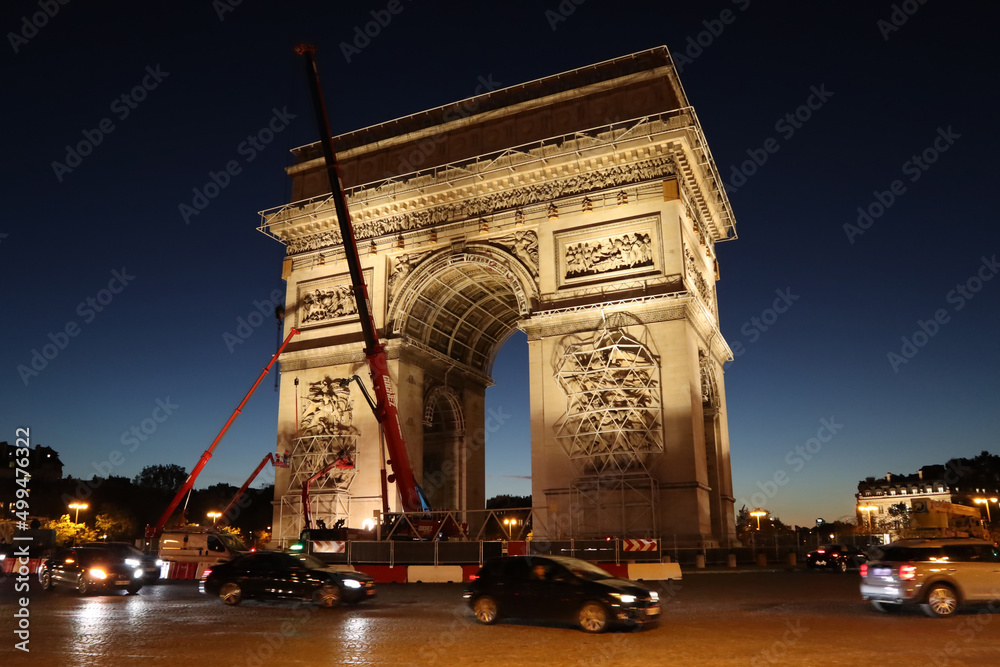Dismantling work of a temporary art installation on the Arc de Triomphe in Paris