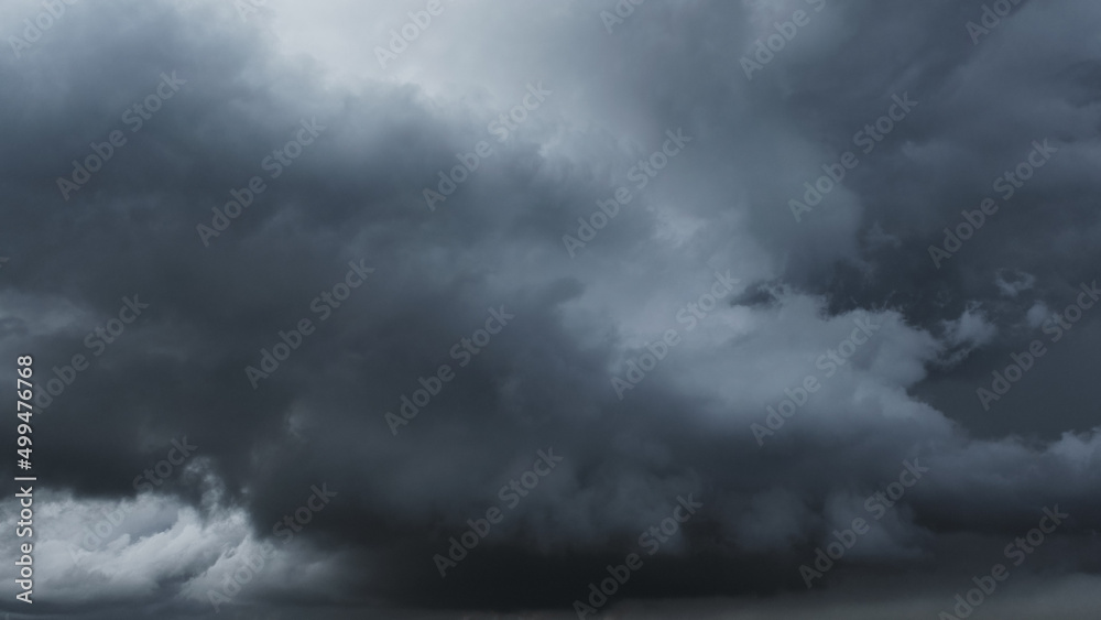 Dramatic dark storm clouds in sky background Dramatic dark storm clouds in sky background