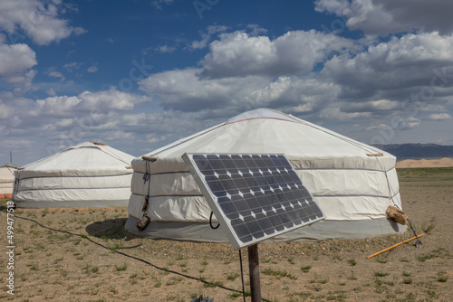 Traditional Mongolian portable round tent yurt and solar panel in Gobi desert, Mongolia photo