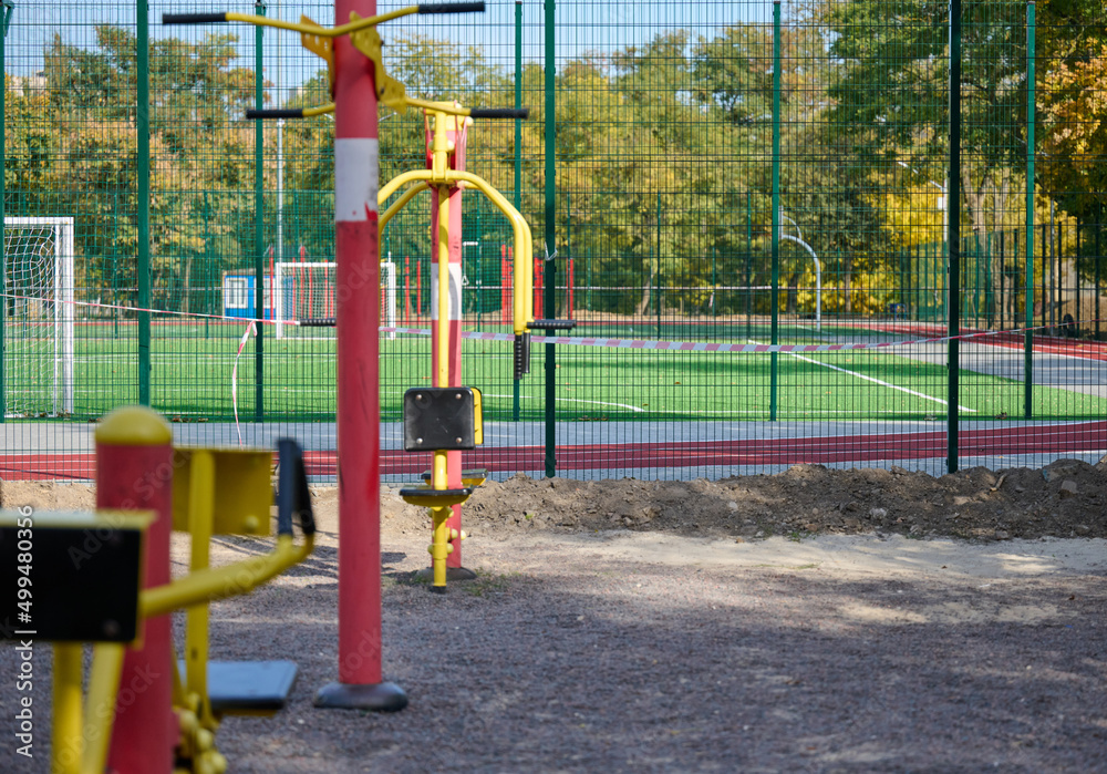 sports equipment in a public park without people, an empty playground during a pandemic and epidemic. Lockdown time