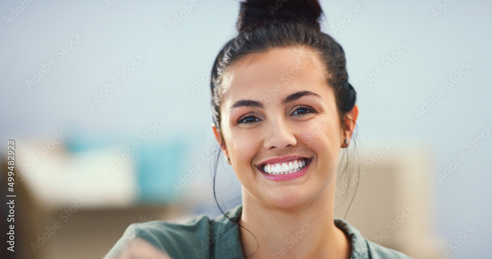 This is my new beginning. Portrait of a young woman in her new home. This is my new beginning. Portrait of a young woman in her new home.