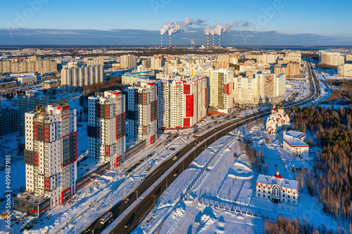 Surgut city in winter. Residential area, city development. Aerial view.