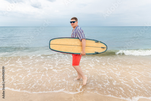 Photography Portrait of young adult stylish caucasian man wear casual shirt and sunglasses enjoy having leisure time surfing at ocean seaside travel vacation tropical resort