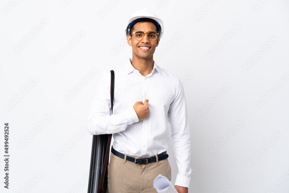 African American architect man with helmet and holding blueprints over isolated white background _ with surprise facial expression African American architect man with helmet and holding blueprints over isolated white background _ with surprise facial expression