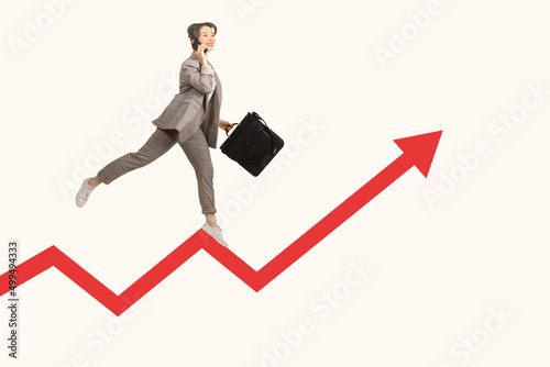 Woman running on growing gr...