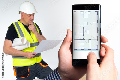 Civil engineer with drawing...