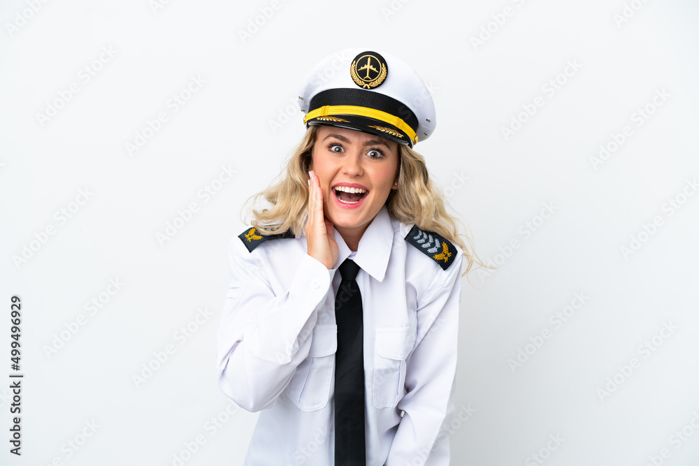 Airplane Brazilian pilot isolated on white background with surprise and shocked facial expression