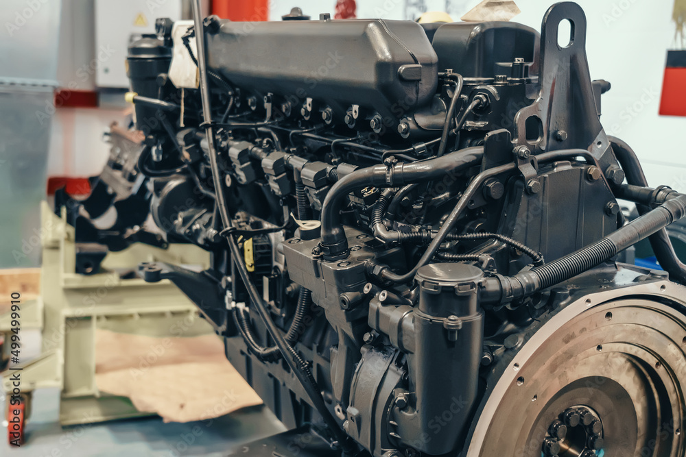 Φωτογραφία Diesel engine motor of tractor or combine harvester in industrial factory close up