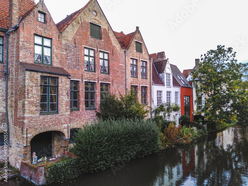The medieval architecture of Bruges town, Belgium reflected in a water 