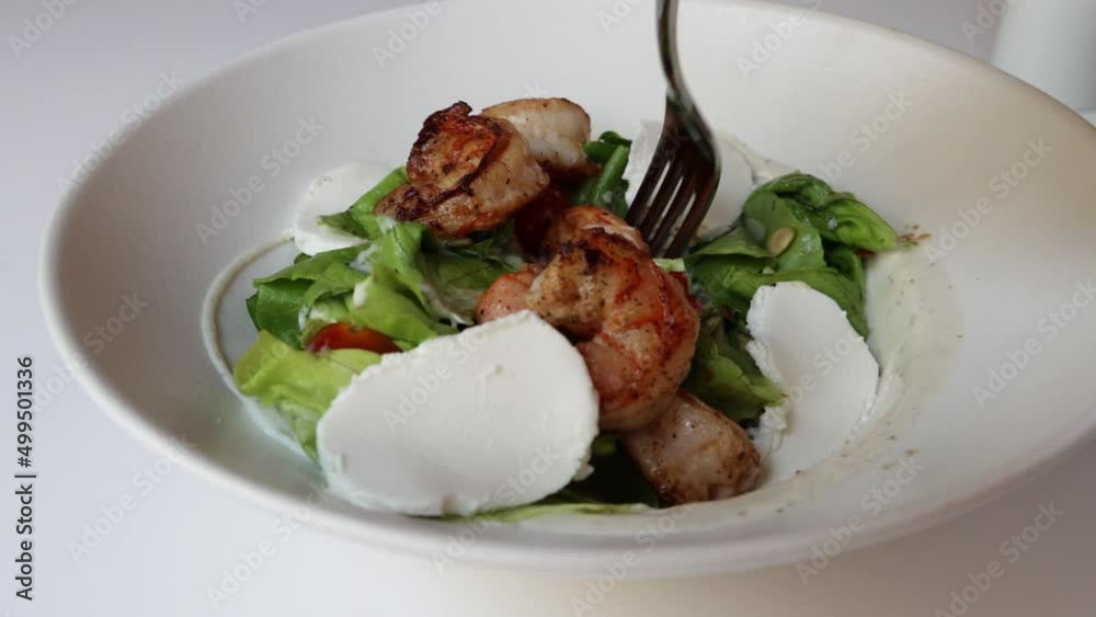 Eating Grilled Shrimp Salad with Goat Cheese Eating Grilled Shrimp Salad with Goat Cheese