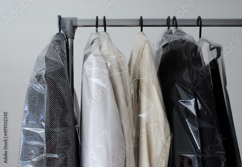 Cuadro en lienzo Rack with clean coats after dry cleaning on a dry cleaner.