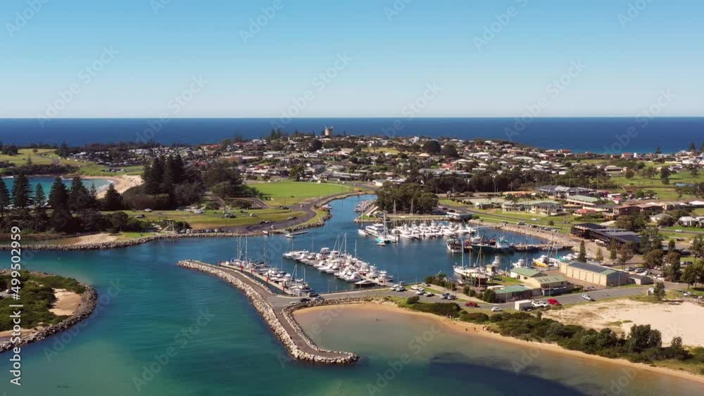 Bermagui town, river and harbour in aerial panning on Sapphire coast as 4k.
Bermagui town, river and harbour in aerial panning on Sapphire coast as 4k.