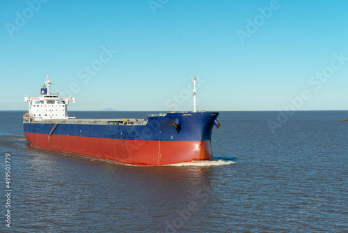 Large bulk cargo ship underway. Big bulker vessel cargo export and import operation.