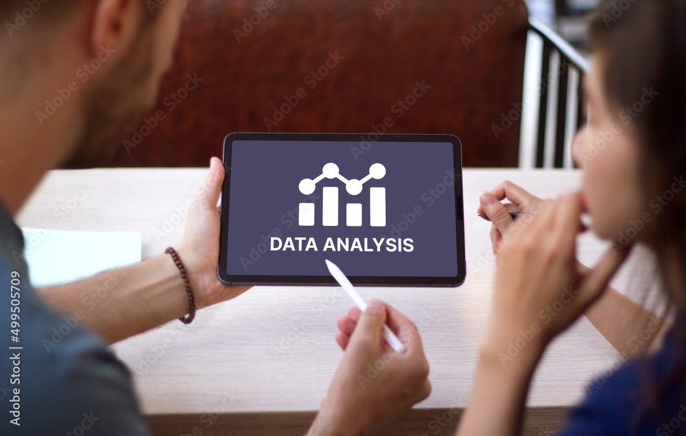 People working with data analysis tool. Young man and woman holding tablet showing infographics chart concept. People working with data analysis tool. Young man and woman holding tablet showing infographics chart concept.