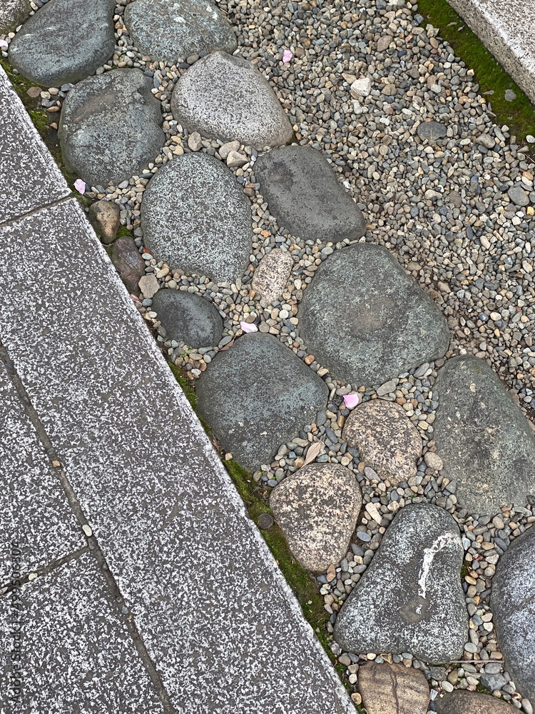 Stone pavement at Japanese shrine of Tokyo, “Otori” shrine, Japan year 2022 spring, sakura season Stone pavement at Japanese shrine of Tokyo, “Otori” shrine, Japan year 2022 spring, sakura season
