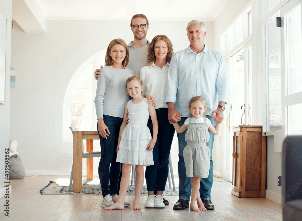 Precious time together. Portrait of a family with their grandparents bonding together at home. Precious time together. Portrait of a family with their grandparents bonding together at home.