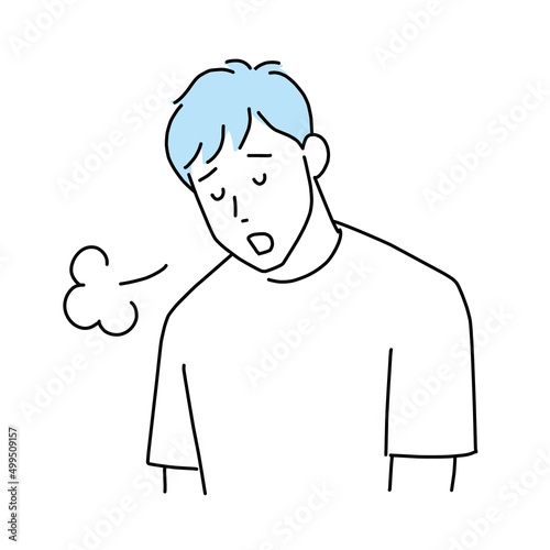 落ち込んでため息をつく男性