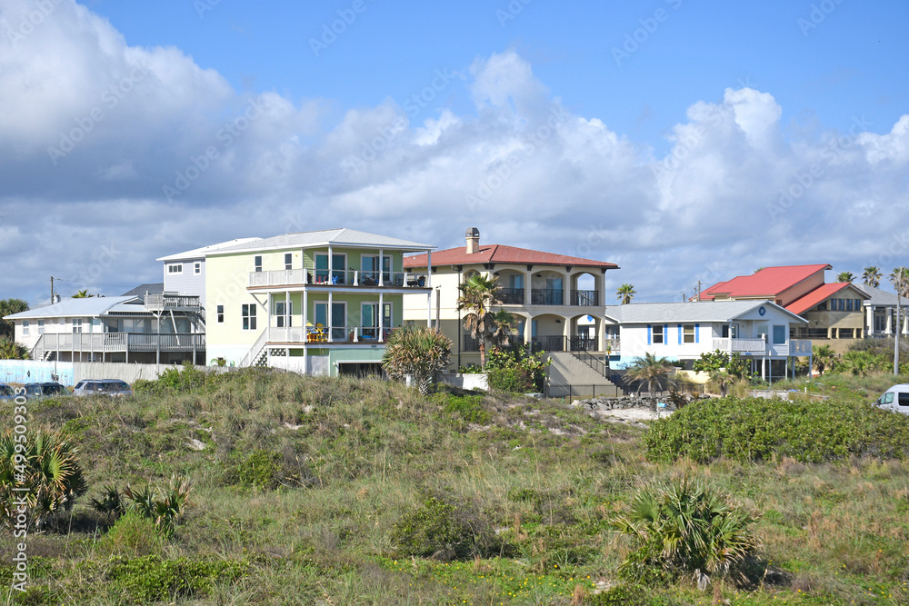 Multi story beach front vacation rental houses on stilts in St Augustine Florida
