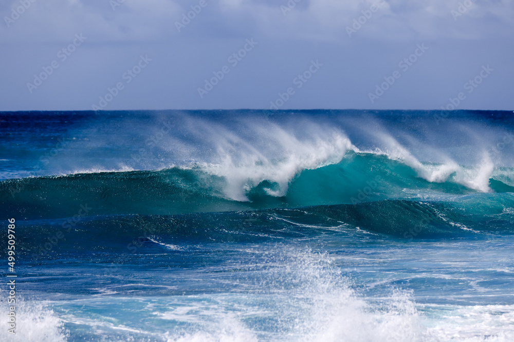Waves crashing along Sunset Beach on Oahu Waves crashing along Sunset Beach on Oahu