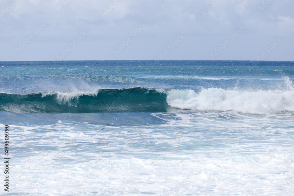 Waves crashing along Sunset Beach on Oahu Waves crashing along Sunset Beach on Oahu