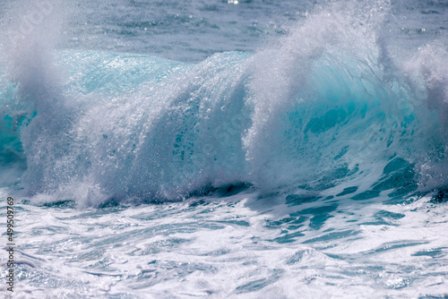 Waves crashing along Sunset Beach on Oahu