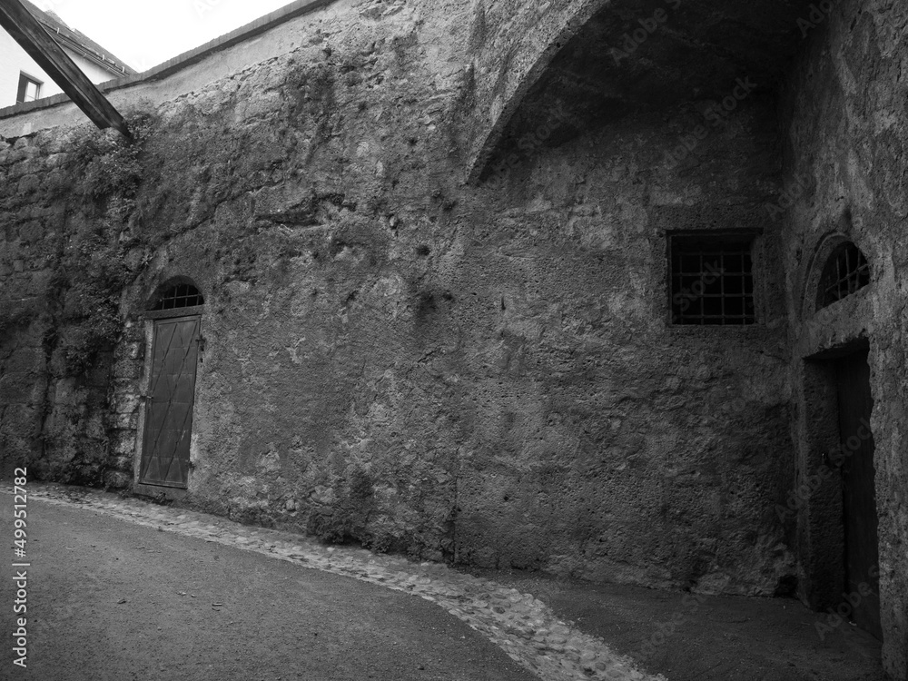 black and white old abandoned house in town black and white old abandoned house in town