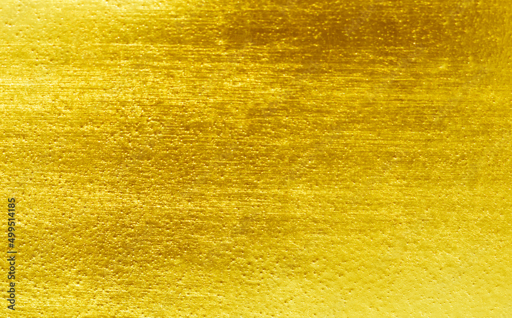Naklejka premium Shiny yellow leaf gold foil texture