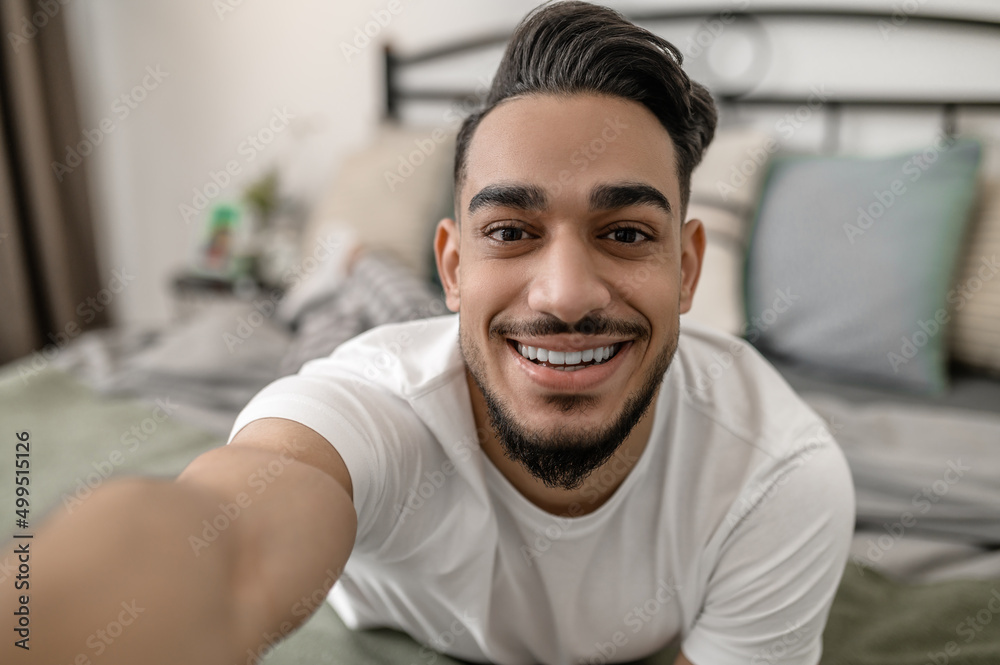 A young man spening day at home and feeling relaxed A young man spening day at home and feeling relaxed