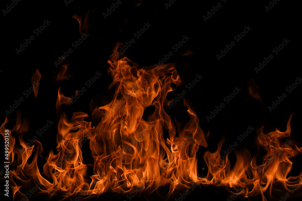 Fire flames isolated on black background. Fire burn flame isolated, flaming burning art design concept with space for text.