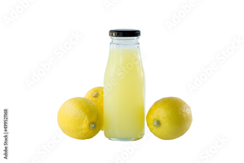 Lemon juice in a bottle and three lemon health food concept.