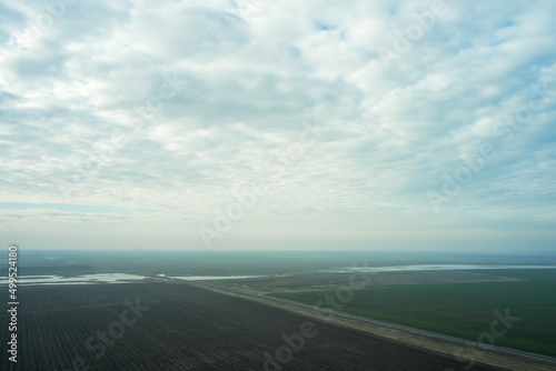 steppe plain landscape lake in the middle of fields