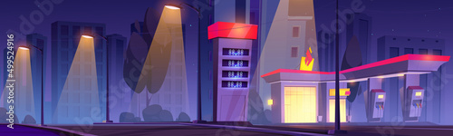 Gas station with oil pump on city street at night. Vector cartoon illustration of cityscape with buildings, trees, street lights and empty fuel filling station with market and prices display on road