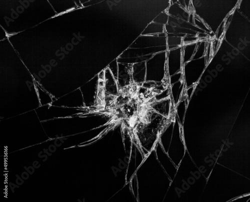 Broken glass isolated on black background.