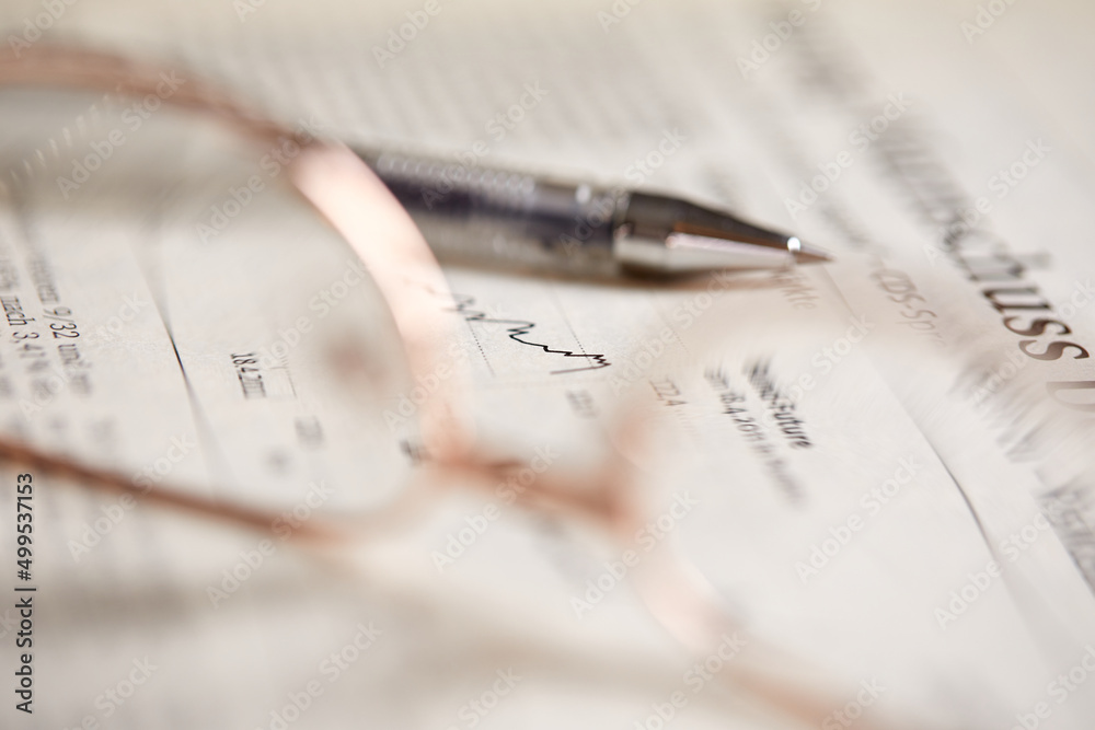 eyeglasses on the newspaper pages eyeglasses on the newspaper pages