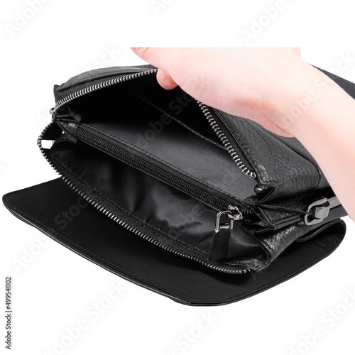 Classic black leather mens bag on a white background. Female hand holding an open bag
