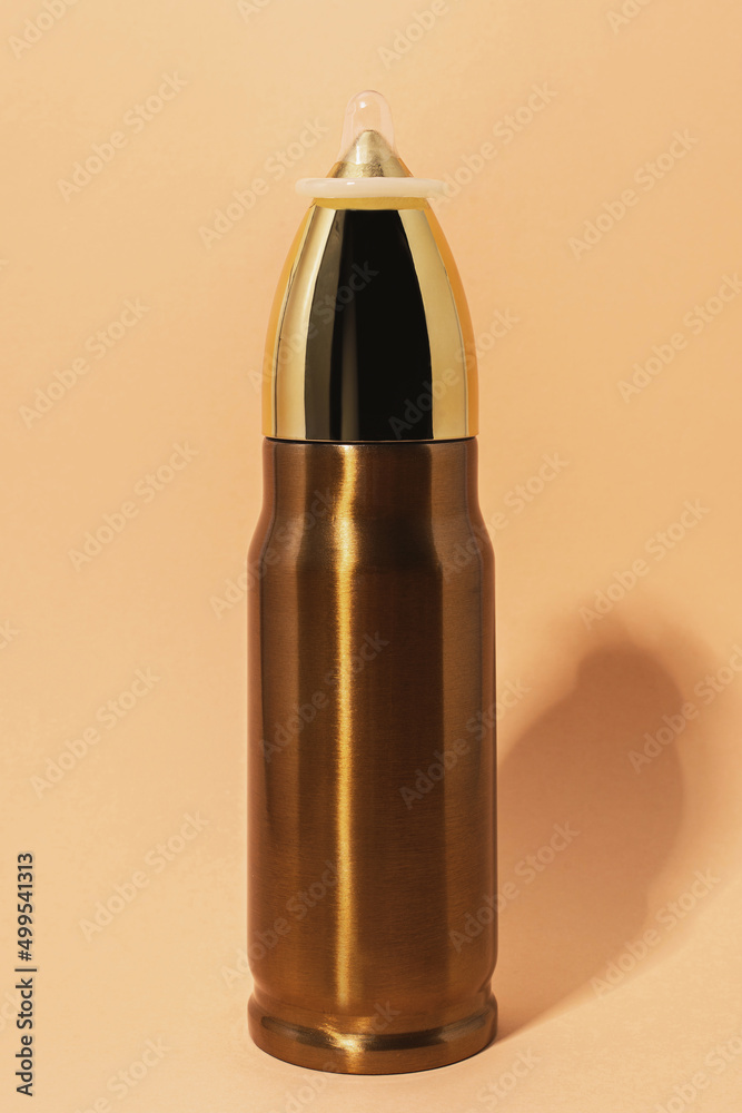 Make love, not war. Pacifism and non-violence movement. Bullet with a condom on the top. Make love, not war. Pacifism and non-violence movement. Bullet with a condom on the top.