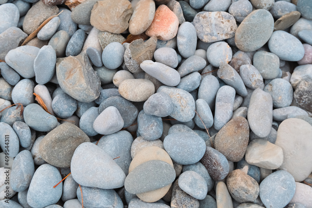 pebbles on the beach. outdoor natural surface in sunset golden hour pebbles on the beach. outdoor natural surface in sunset golden hour