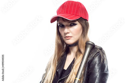 Sportive Caucasian Female Baseball Player Athlete Posing With Bat Stem While Wearing Red Cap And Black Leather Jacket Against Pure White Background. © danmorgan12